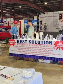 Best Solution booth with customers at an indoor show