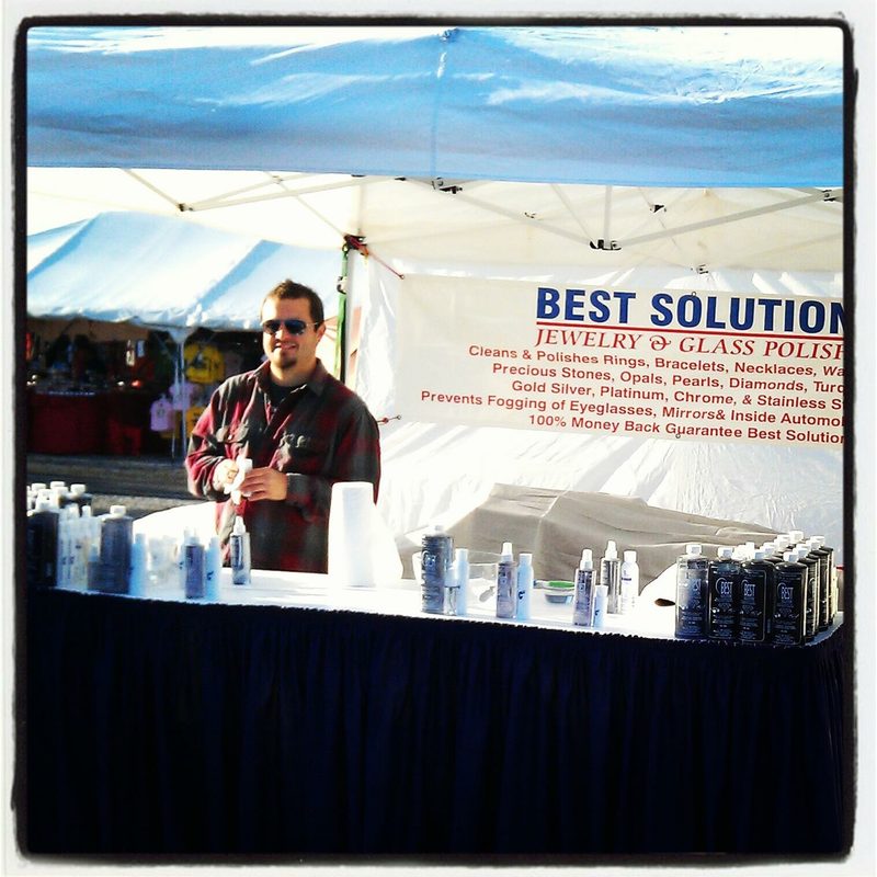 Best Solution owner at a sunny outdoor market
